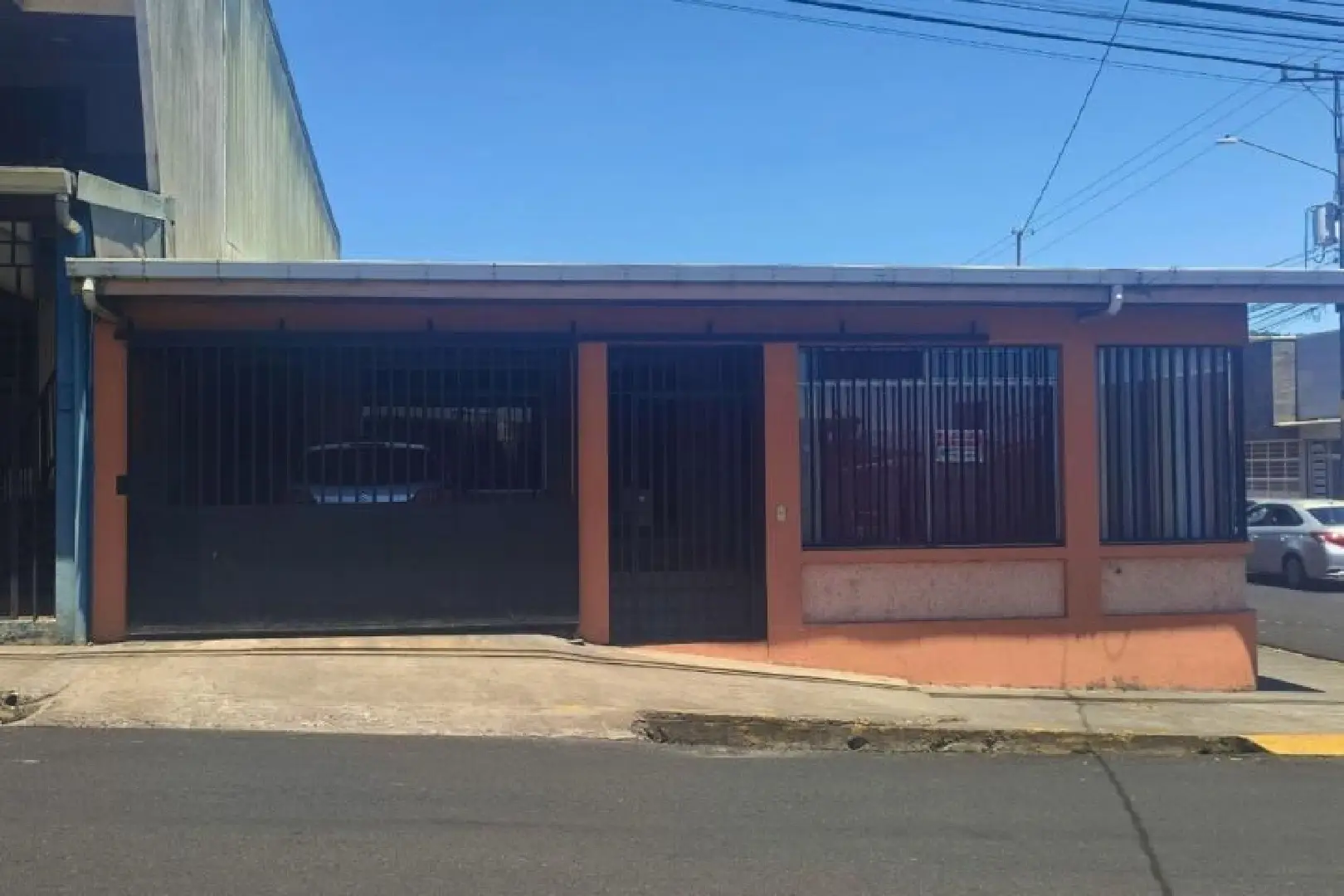 A building with a large window on the side of it.